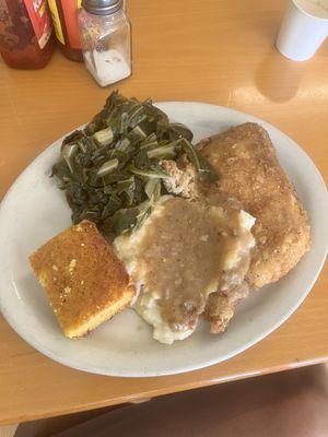 fried chicken, mashed potatoes, greens, and corn bread.