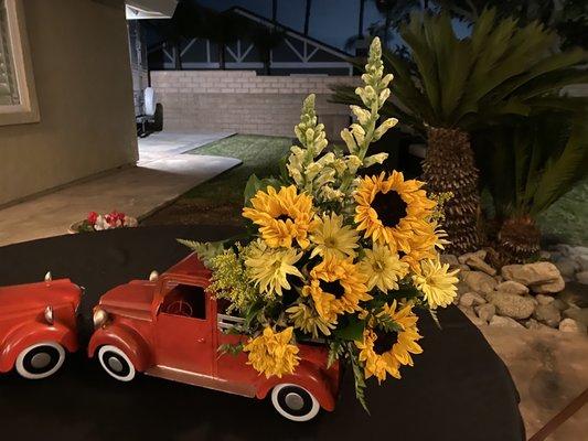 We brought in the truck she put in the flowers.