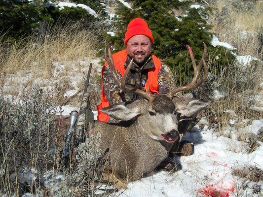 Hunter, Brandon Cropsey (MI) tags out during his rifle hunt with Stockton Outfitters.