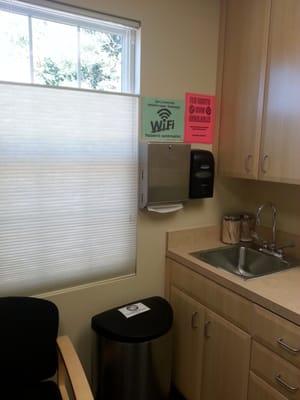 Inside an exam room. There's free WiFi here for patients.