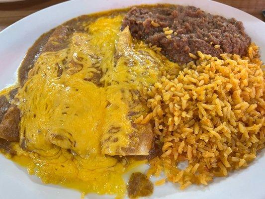 Cheese enchilada, beans and rice