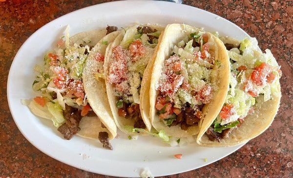 Soft Corn Tortillas, Pulled Chicken, Onion Cilantro, Lettuce, Tomato & Cotija Cheese