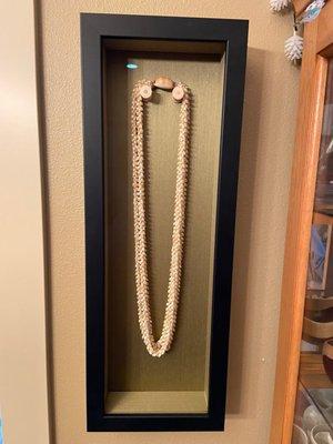 Shadow box for shell lei