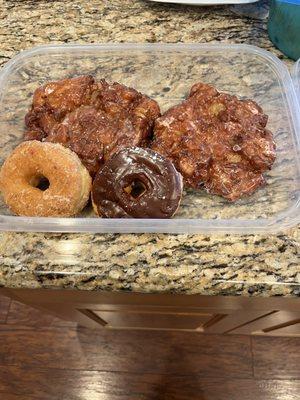 Enormous scrumptious apple fritters and delicious glazed & chocolate glazed donuts.