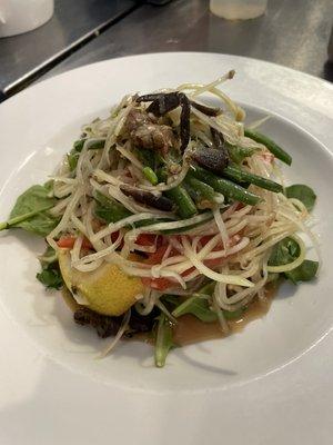 Papaya salad Lao style with anchovies and pickled crab