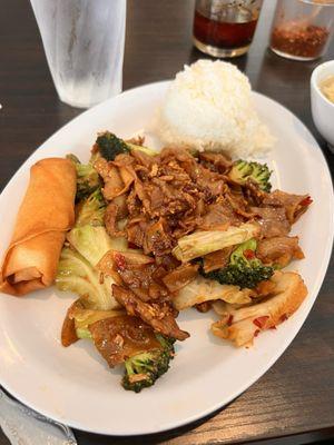 Pad see ew with beef, egg roll and scoop of rice all part of the 10.99