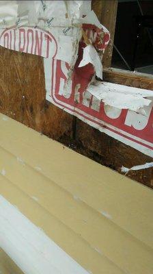 Bedrock did not replace rotted plywood before new siding was installed per contract. House wrap was never installed.