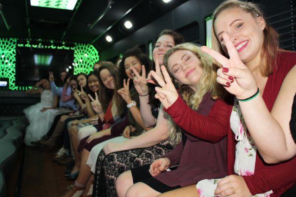 The new limo bus has leather wrap around bench seating for 26 passengers.