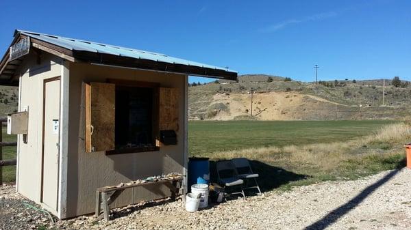 Information booth with fossil fields in the background