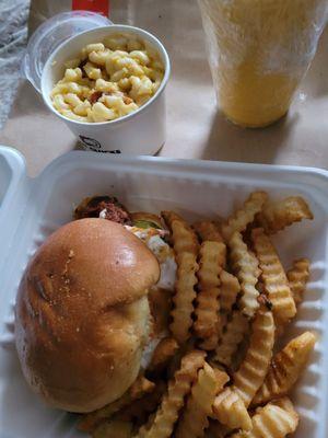 Hot cheese clucker n fries. Side of Mac n cheese and mango smoothie.