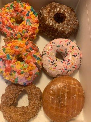 Clockwise : 2 fruity pebbles, Cronut, strawberry frosted, jelly, and churro.