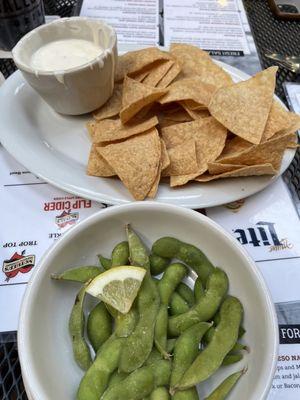 Chips and queso and edamame