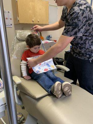 Edwin Getting my son ready for his first cleaning