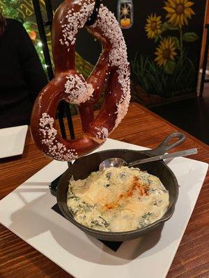 Pretzel and kale and artichoke dip.