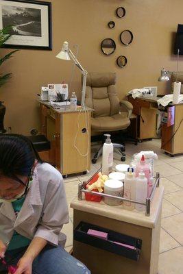 I'm getting a pedicure. You can see the nail stations across from me.