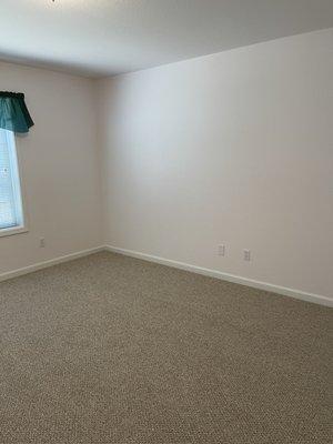 This room had a large desk against the wall that was painted around. They were able to make that spot blend so it all looks beautiful!