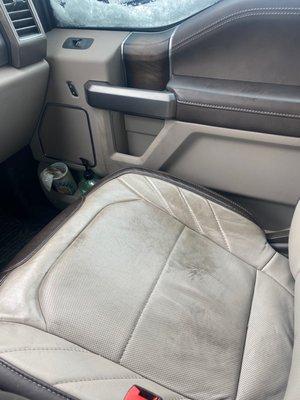 Oil all over our leather seat, door, and Kleenexes after our Jiffy Lube oil change.