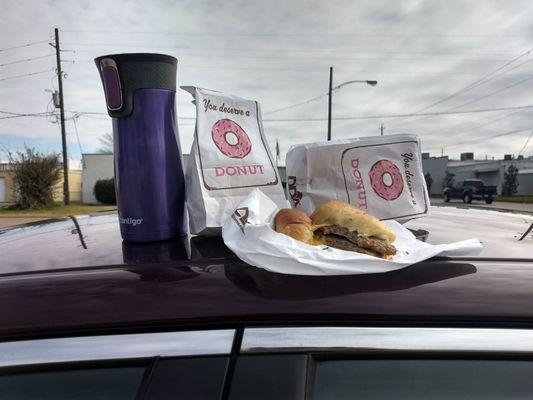 breakfast to go: coffee, kolache, donut