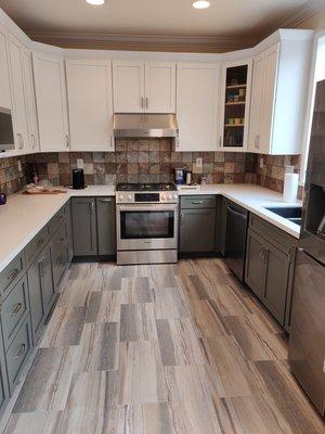 Bertch Cabinets. White Upper Cabinets and Custom Green for Base Cabinets