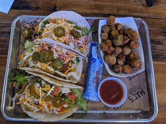 Three tacos with fried okra