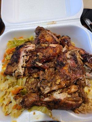 Jerk chicken,  rice and peas , and vegetables