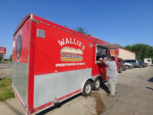 Food truck. Between a gas station and family dollar