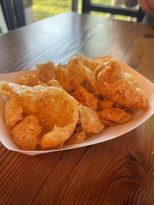 Complimentary Pork rinds! I ate mine with some hot sauce of course