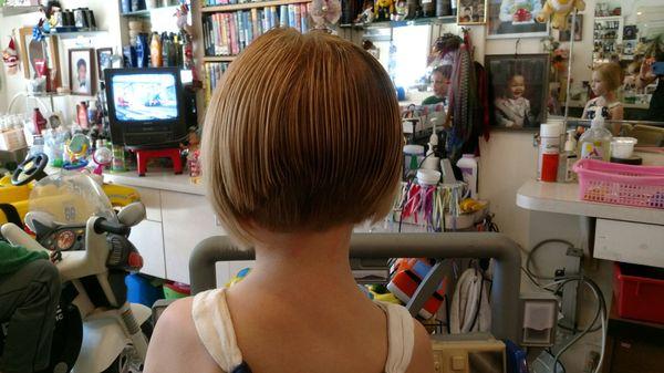 Alice gave my daughter the cutest A-line haircut. She loves it. Thanks!