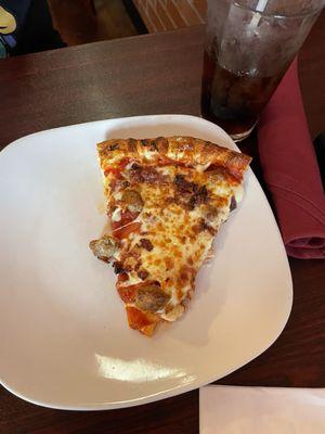 Slice of the meat lovers pizza