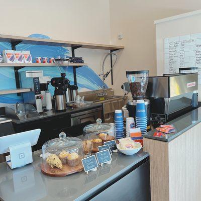 Cafe with freshly made sweets on display.