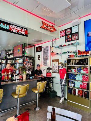 Cool retro decor and lots of merch displayed in a fun way.