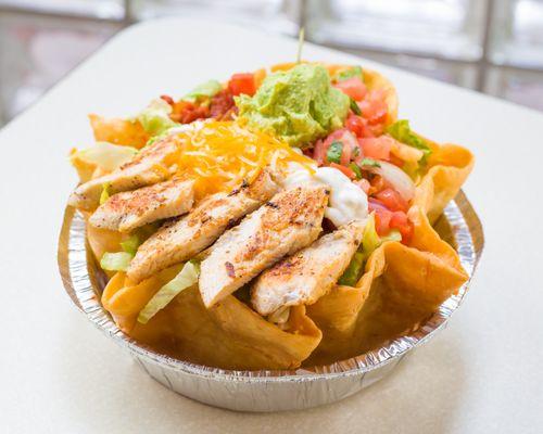 Taco Salad w/ a choice of Steak, Chicken, Beef, or Veggie. Includes lettuce, pico de gallo, sour cream, salsa, and cheese. Guac is extra.