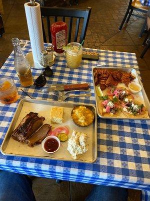 Sliced brisket, brisket tacos, sweet potato fries