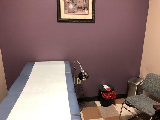 Patient exam room (not sure what's up with the tiny lamp on the floor)