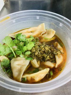 Homemade dumplings w/house beef soup