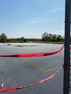 Tennis courts under construction with the floor