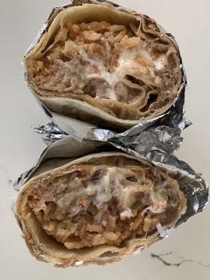 Carne asada burrito. Rice, beans, carne asada, sour cream and salsa.