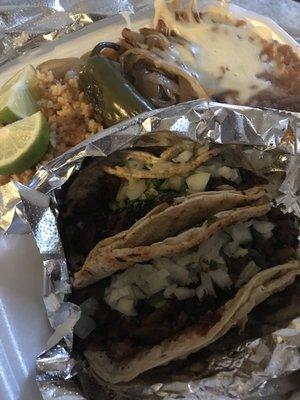 Taco dinner - the el pastor with rice + beans..so good