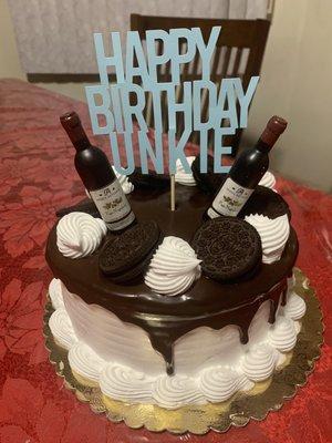 I added the cake topper and bottles to decorate the cake.