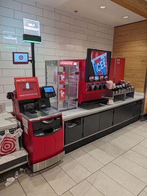 Grab-and-go section with a self-checkout kiosk