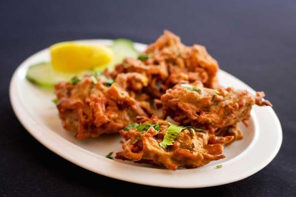 Onion Bhaji...Onion, potato, and spinach fritters fried in a gram flour batter.