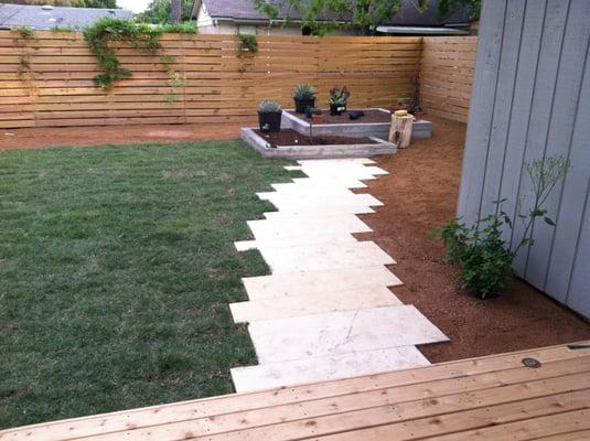 limestone path to custom concrete planter