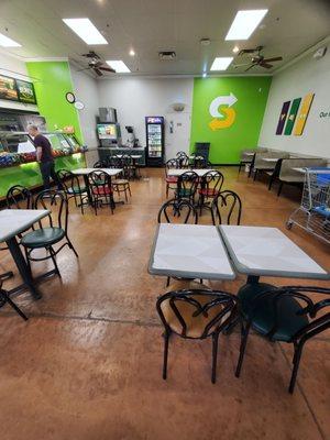 Seating area inside Subway restaurant