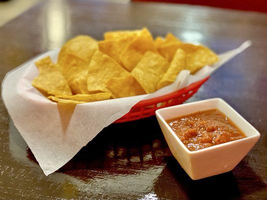 Warm Chips & house salsa. It's mild. You have to ask for the spicy salsa.