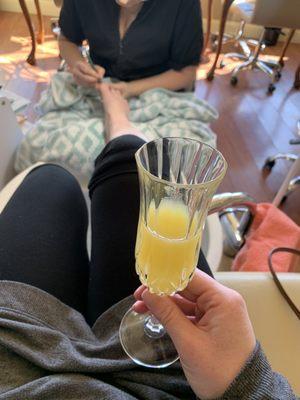 Complimentary mimosa with pedicure