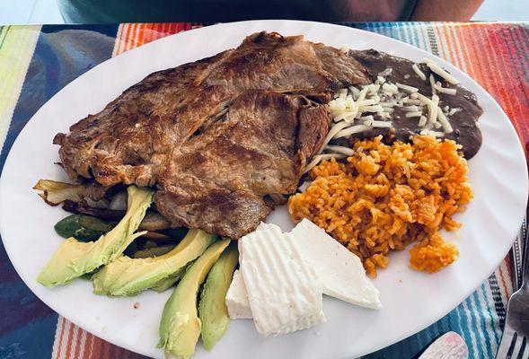 Cane Asada plate, flavorful , generous portion, unique combination of sides to create different bites