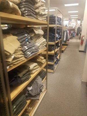 Neatly folded and stacked men's pants