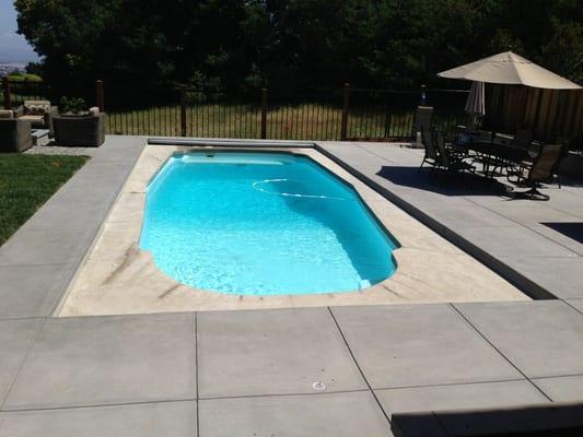 Free form pool with auto cover