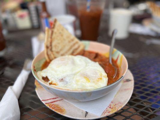 Moroccan Stew with over medium eggs.