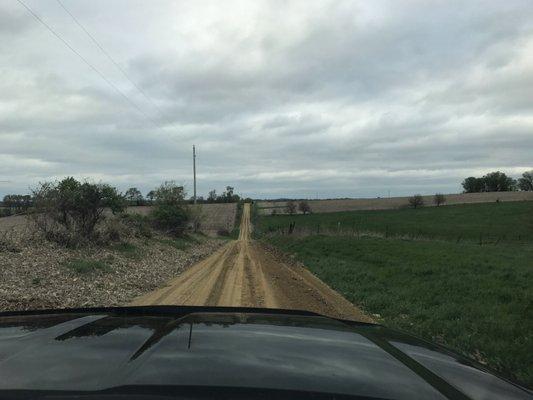 Long gravel road into camp.